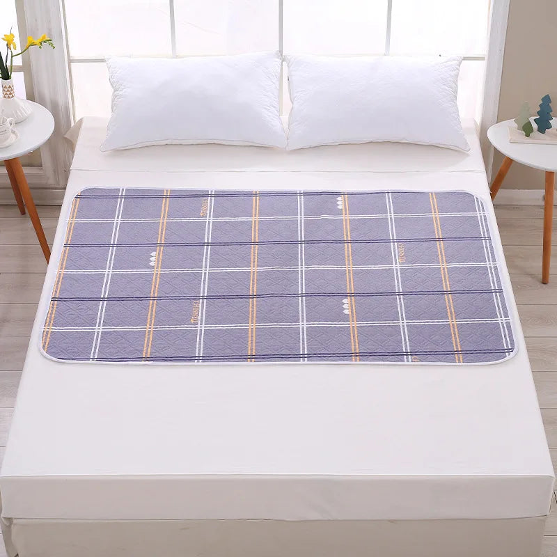 Alèse imperméable 50x70 cm motif carreaux gris