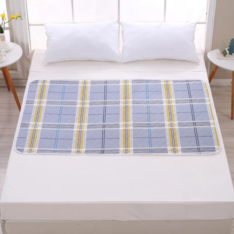 Alèse imperméable 50x70 cm motif carreaux multicolores
