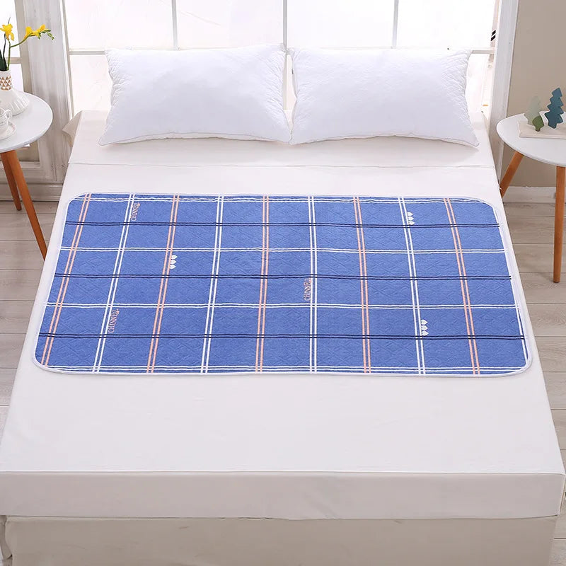 Alèse imperméable 50x70 cm motif carreaux bleus