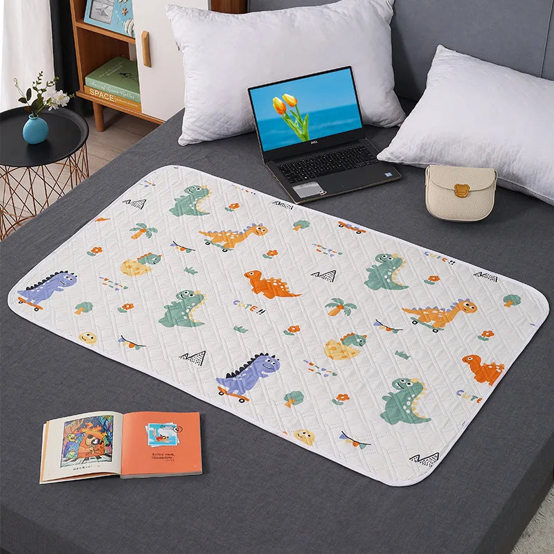 Alèse imperméable 50x70 cm motif dinosaures